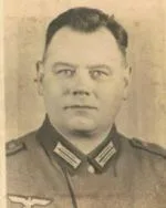 Schwarz-Weiß-Porträt von Hugo Wellmann in Uniformjacke mit Kragenspiegeln.
